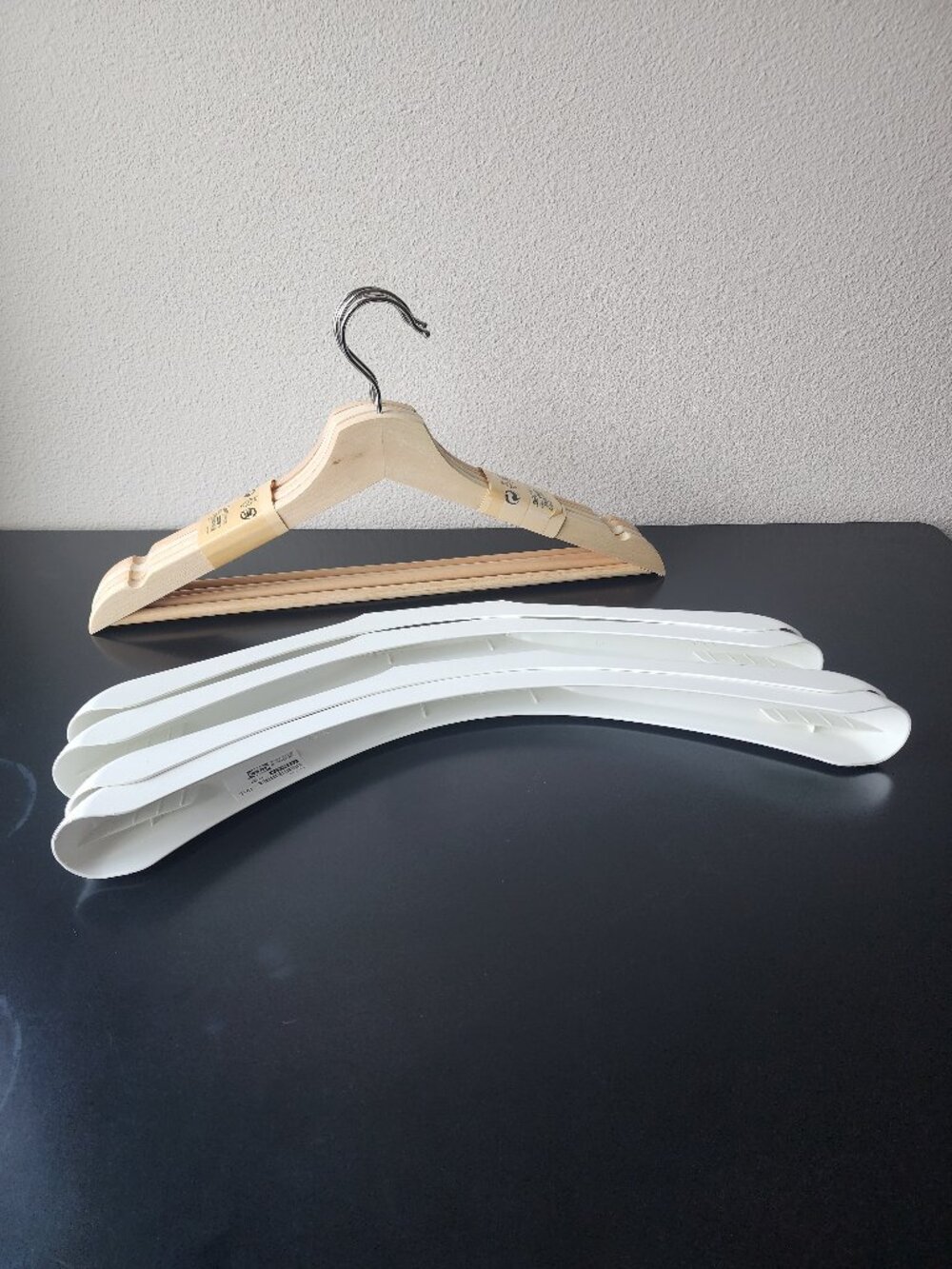 Bundle of 4 IKEA BUMERANG Hangers in natural wood + 4 Shoulder shapers in white